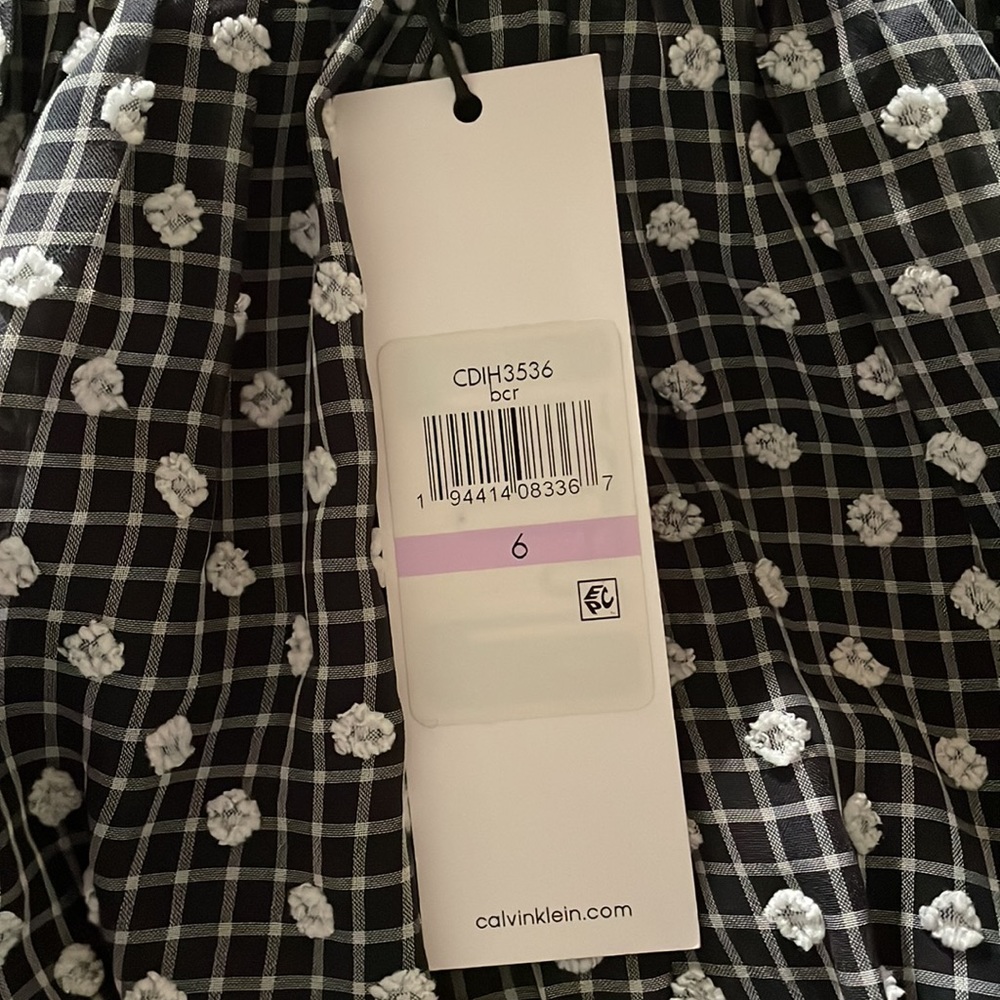 Calvin Klein Dotted V-Neck Short Sleeve Tie Waist
Maxi Dress Black and White - Picture 7 of 7